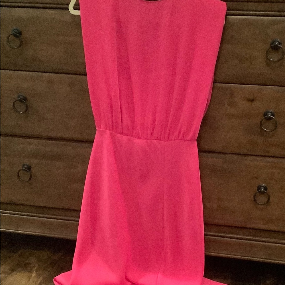 Gorgeous bubblegum pink dress. I’m 5’2 and it comes well below the knee.